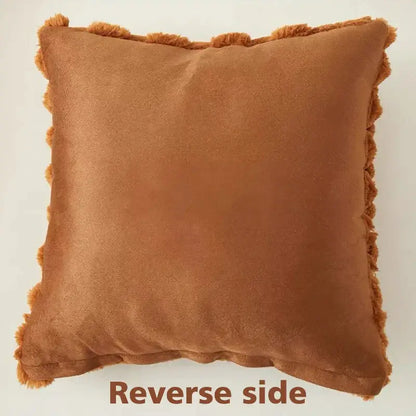 A square rust-colored suede decorative pillow cover with soft fringed edge for modern living room decor