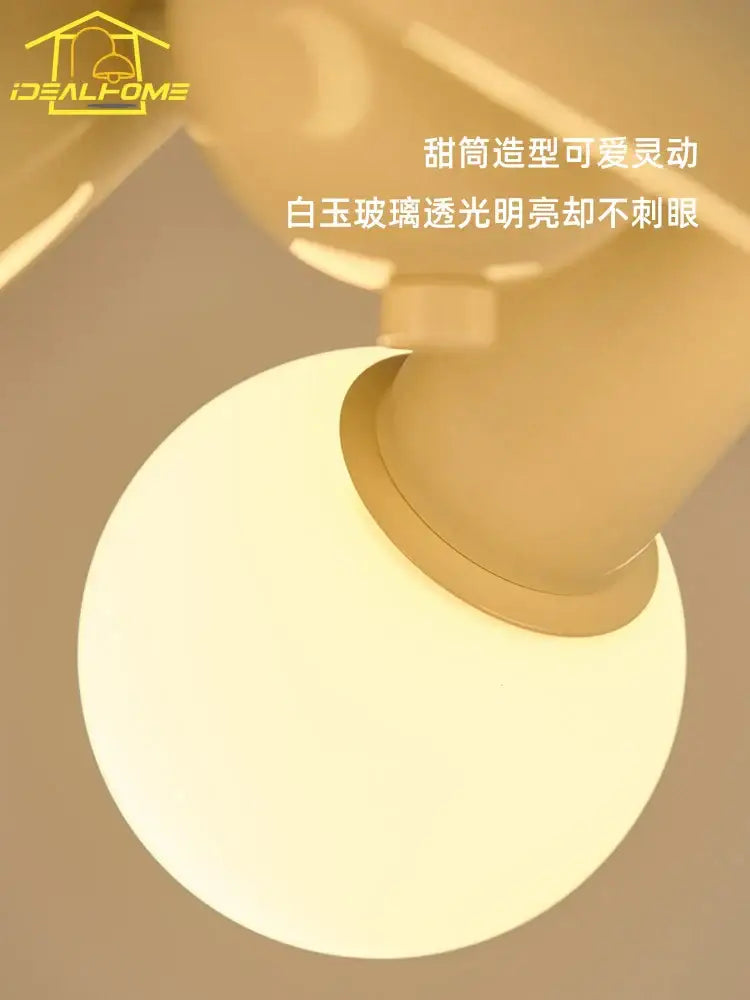 Modern cream wind led ceiling light with warm glowing frosted glass globe and beige metal fixture for bedroom use