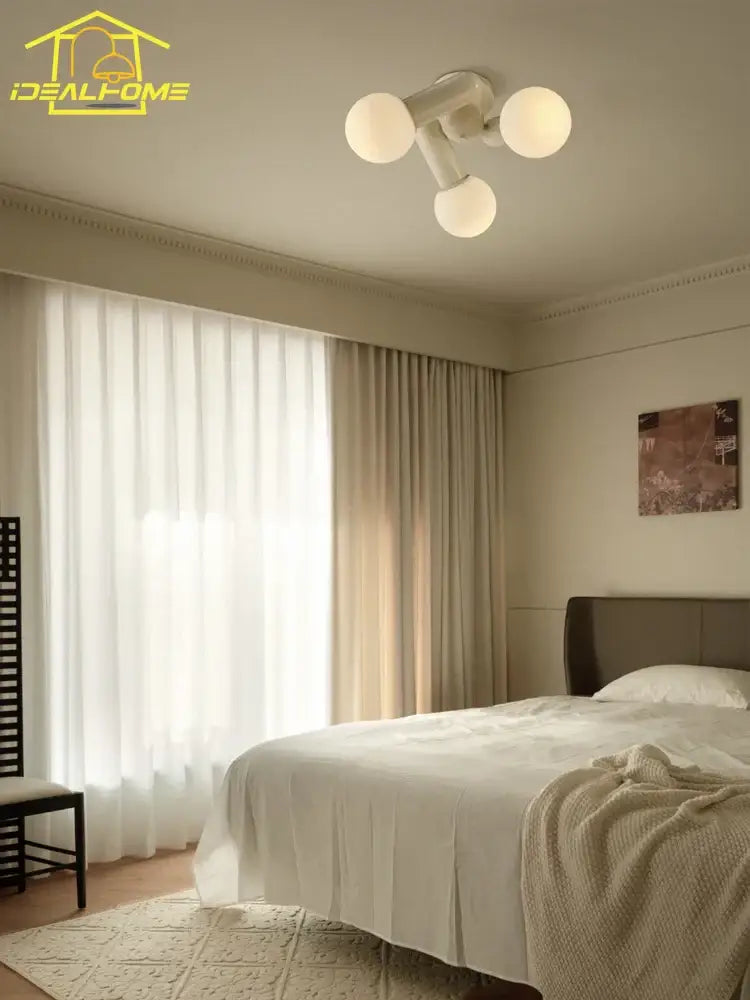 Modern cream wind led ceiling light with four cream wind frosted glass globe bulbs for bedroom lighting