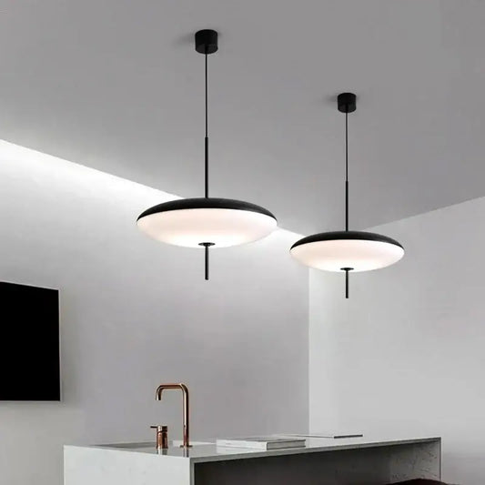 Two sleek black iron pendant lights with frosted glass shades for modern bar and restaurant decorbites iron pendant light design