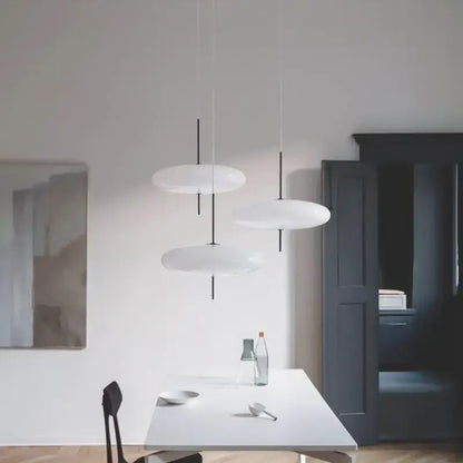 Modern creative iron pendant light with white disc shades and black cords suitable for bar and restaurant decorbites iron pendant