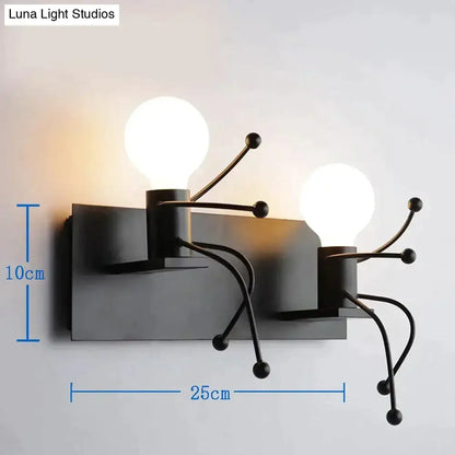 Black modern creative minimalism metal robot ant wall sconce with two exposed bulbs and articulated arms for bedroom use