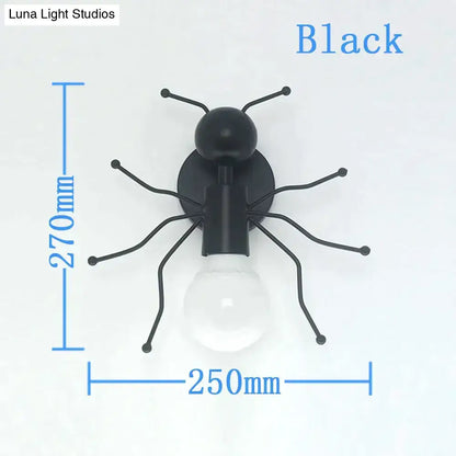 Black ant-shaped wall lamp with matte finish and slender metal legs embodying modern creative minimalism design