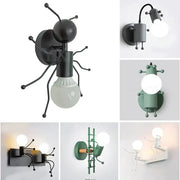 Black metal ant-shaped wall sconce with articulated legs and exposed bulb showcasing modern creative minimalism design