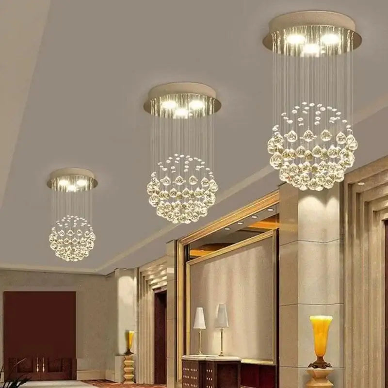Modern crystal ball ceiling chandelier with cascading teardrop glass elements and circular mount for living room decorbites crystal ball