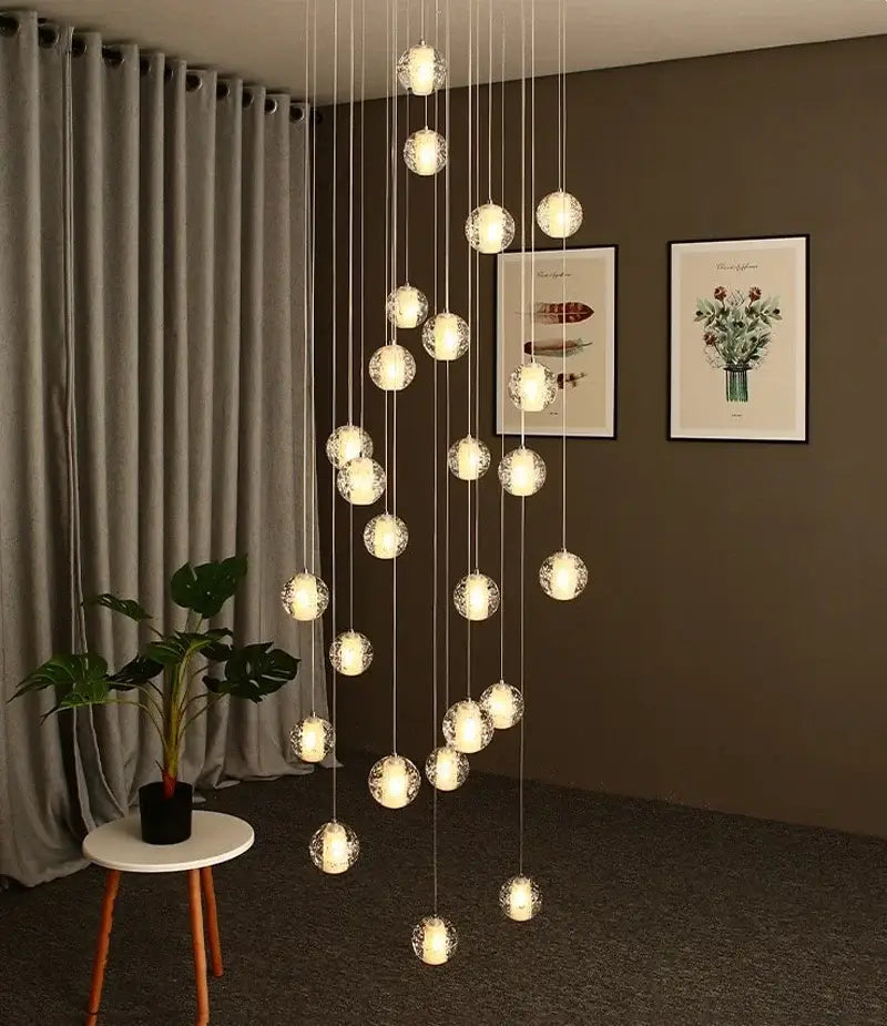 Modern crystal ball led chandelier with frosted glass globes and thin metallic cords for living room decorbites crystal ball
