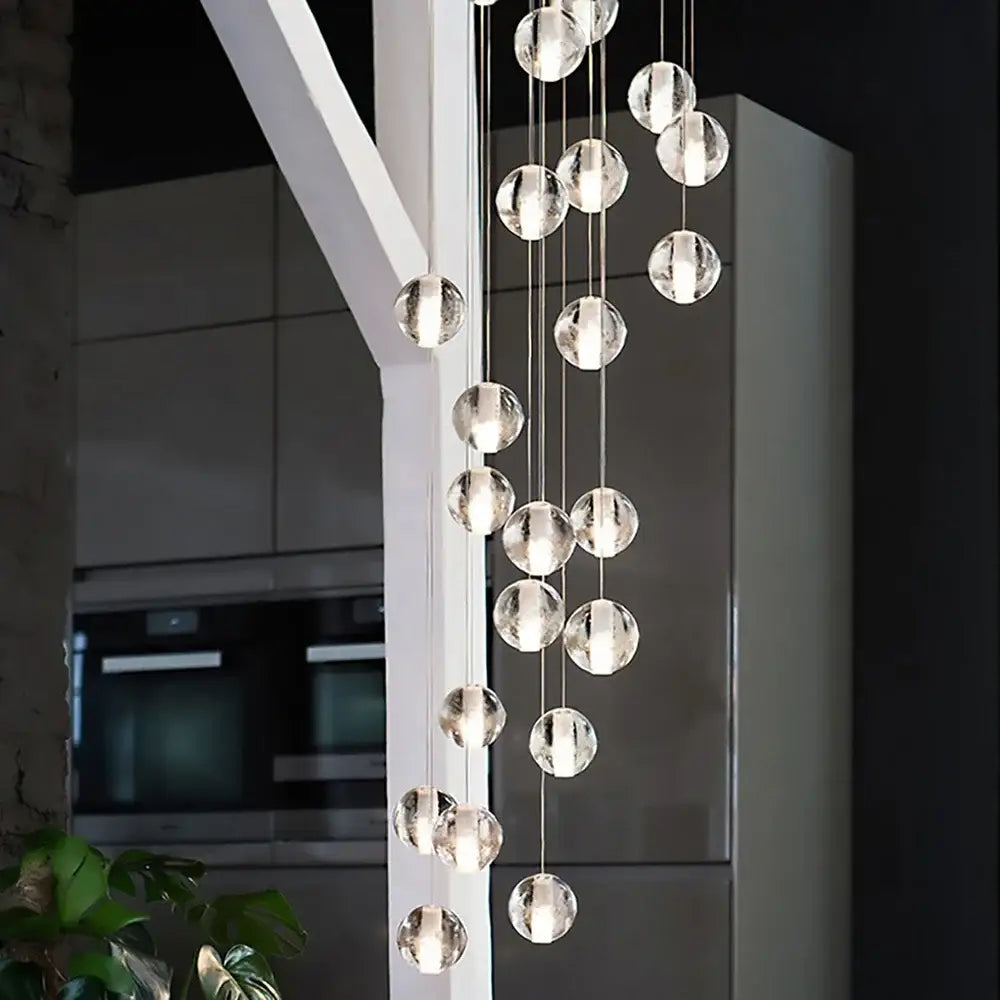 Modern crystal ball led chandelier with clear faceted bulbs and metallic chains for living room decorbites crystal ball