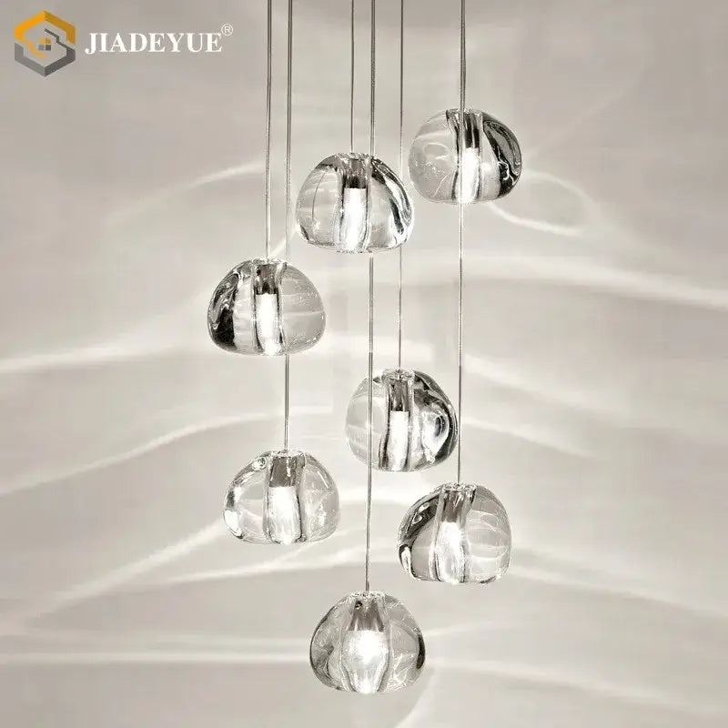 Modern crystal ball nordic led chandelier featuring clear crystal pendant lights with a cascading design for staircase decorbites crystal ball
