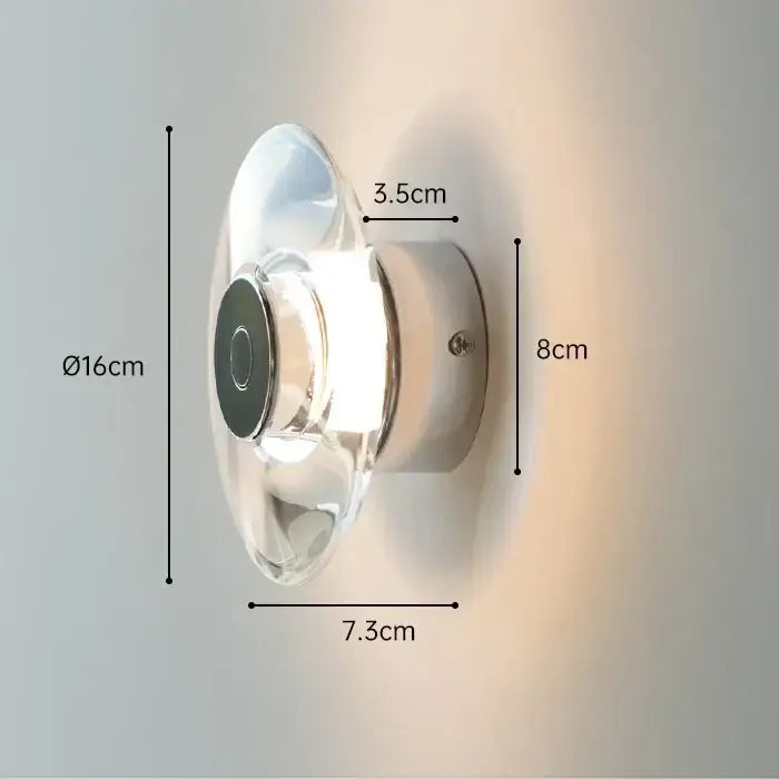 Modern crystal bedside wall lamp with clear glass shade and chrome metallic base for elegant bedroom decorbites crystal bedside design