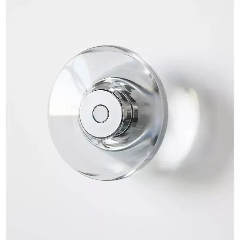 Clear glass door knob with polished chrome center on decorbites crystal bedside wall lamp for modern bedroom decor