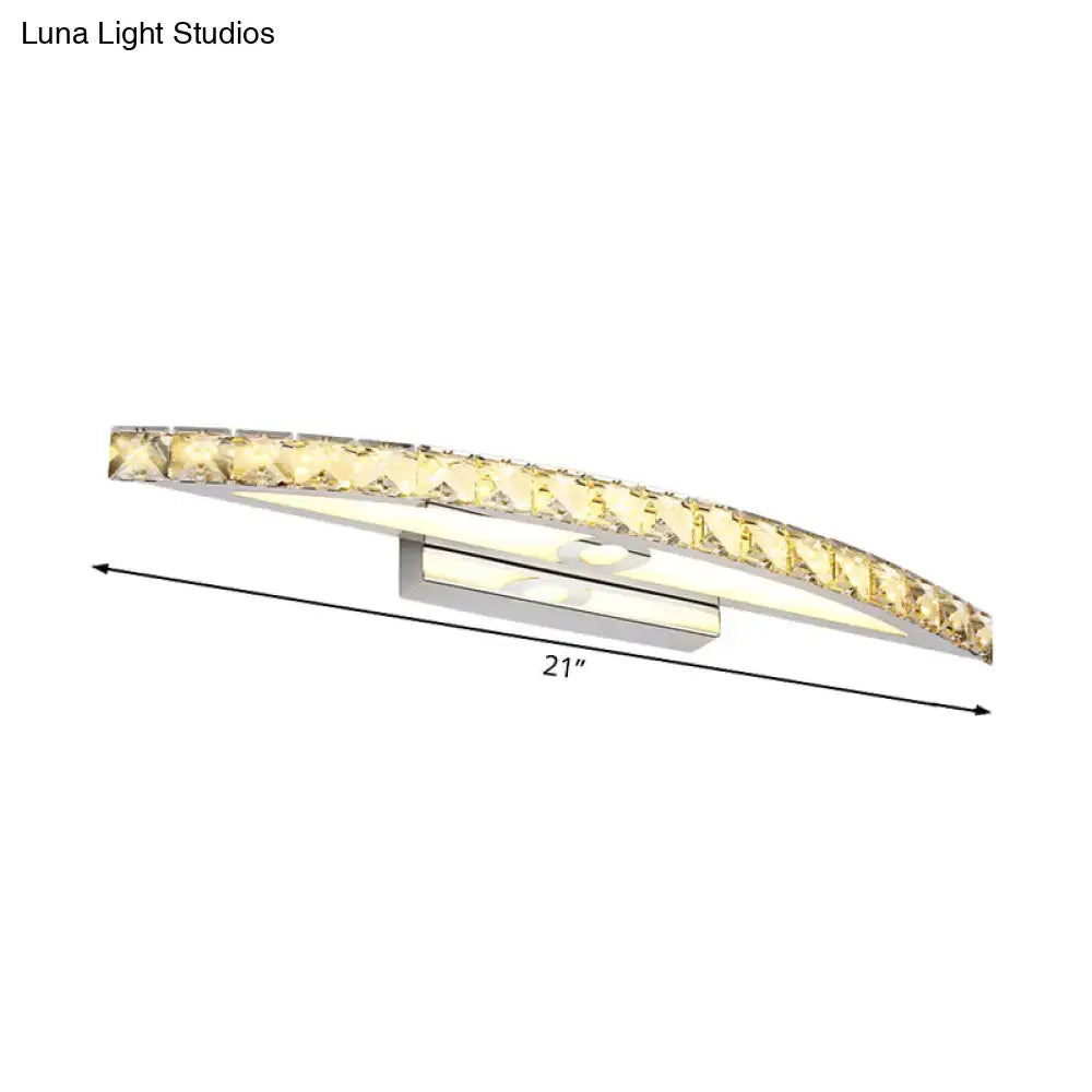 Modern crystal bow bathroom sconce featuring a sleek 21-inch arched clear champagne design with polished chrome and led product bulb