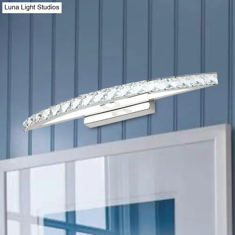 Modern crystal bow bathroom sconce with clear champagne LED bulb featuring polished chrome and clear crystal accents