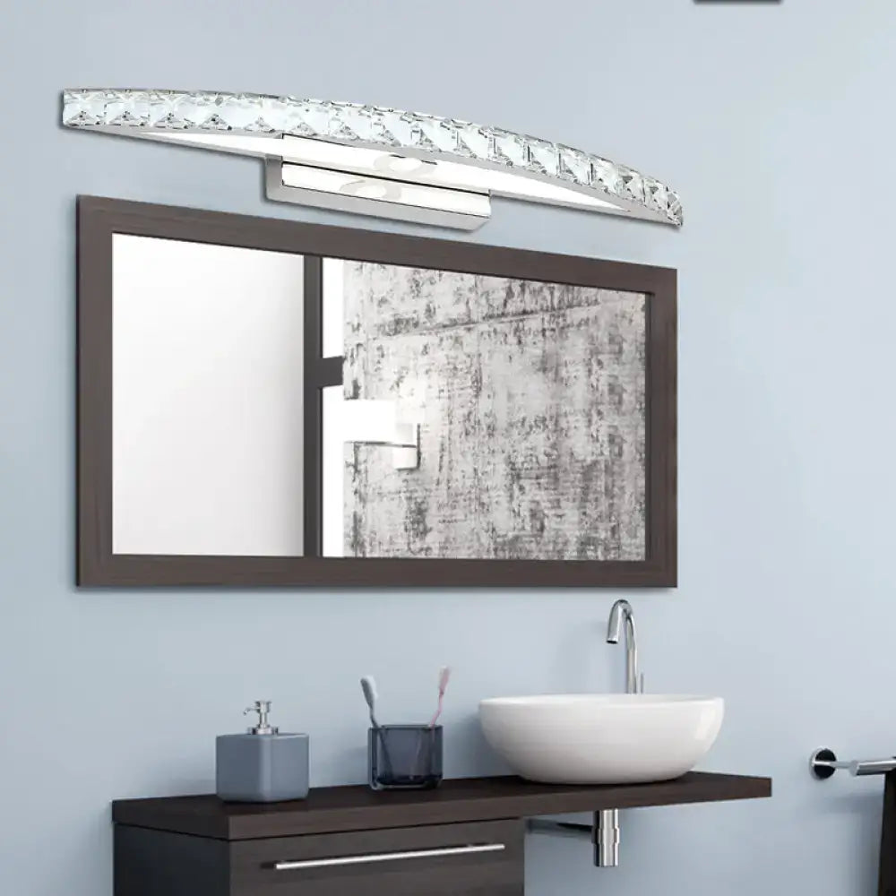 Modern crystal bow bathroom sconce with clear champagne product bulb, featuring a sleek silver frame and clear crystal accents