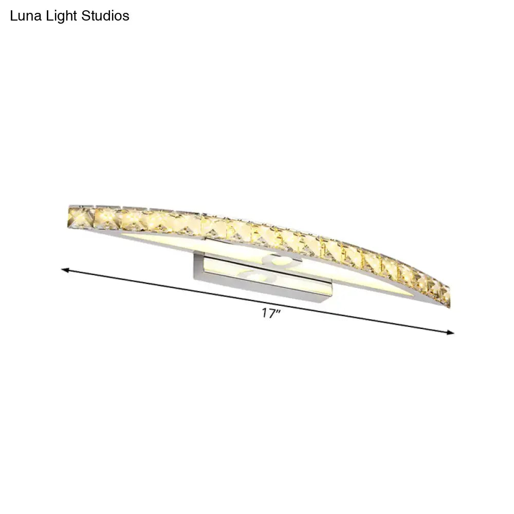 Modern crystal bow bathroom sconce with clear champagne led bulb featuring a 17-inch curved polished chrome frame and crystals