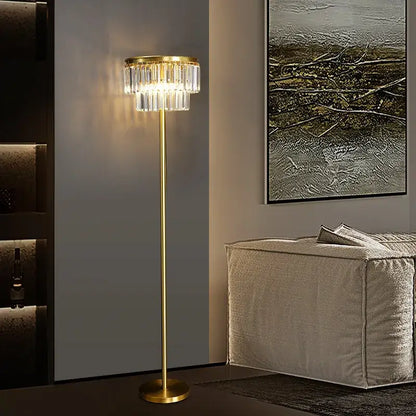 Gold-finished floor lamp with tiered crystal chandelier head in modern decorbites crystal brass floor lighting design