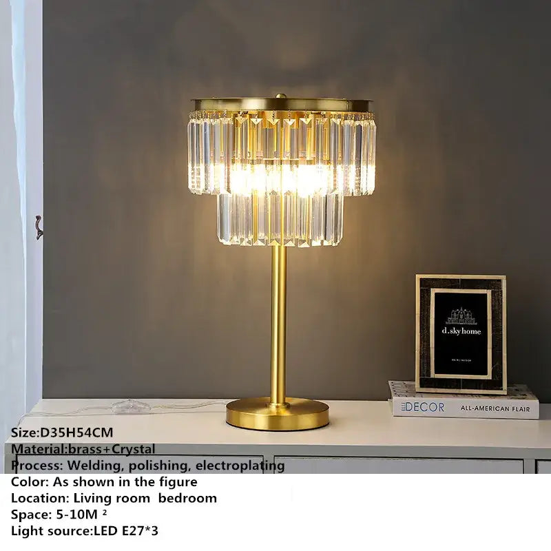 Gold-toned floor lamp with tiered design and cascading clear crystal prisms by decorbites crystal brass for living room decor