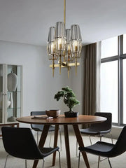 Modern crystal brass glass pendant light featuring brass and clear glass with multiple cylindrical shades for dining room decorbites crystal brass chandelier