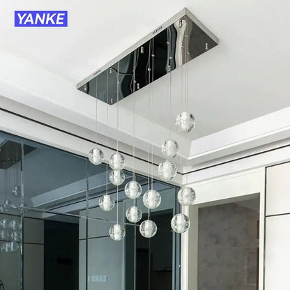 Modern yanke pendant light with sleek chrome finish and multiple hanging decorbites crystal bubble spheres for dining room