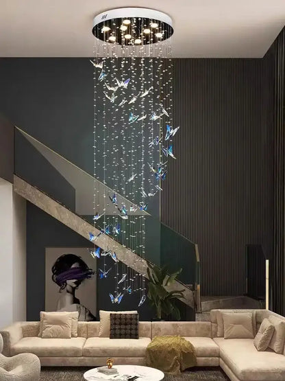 Modern crystal butterfly pendant light chandelier with circular white base and decorbites crystals pendant strands
