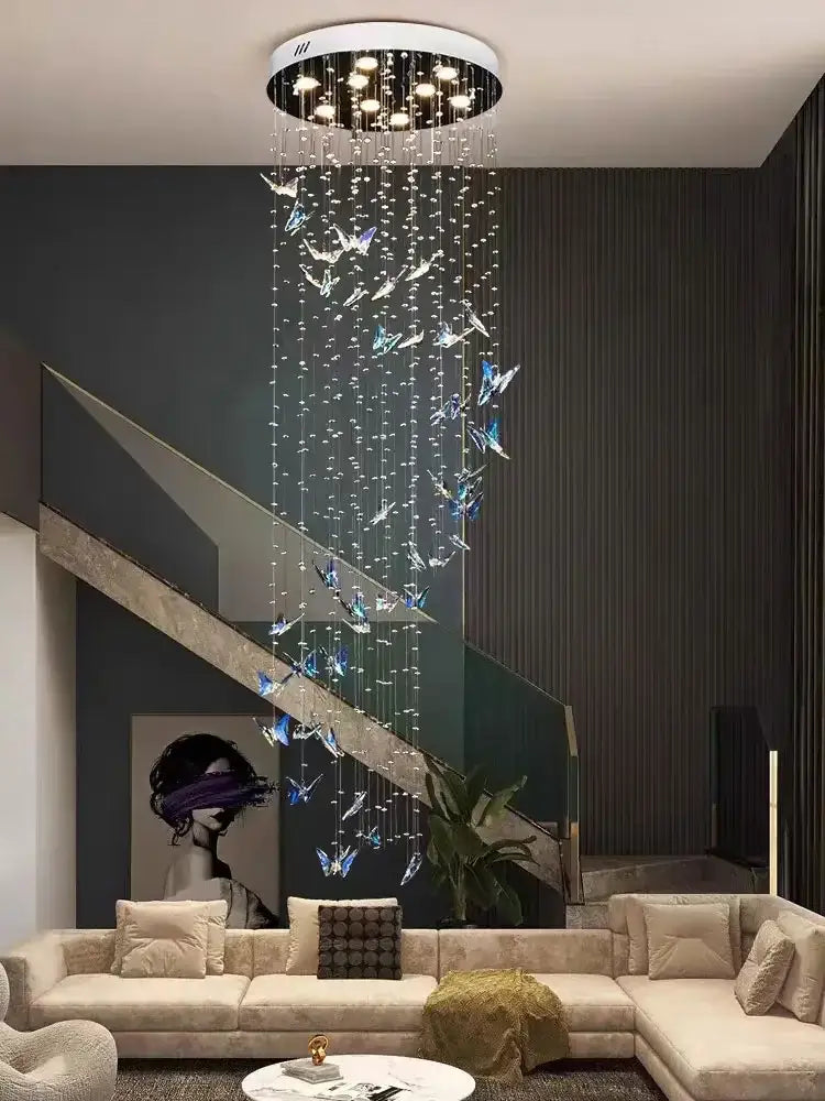 Modern crystal butterfly pendant light chandelier with circular white base and decorbites crystals pendant strands