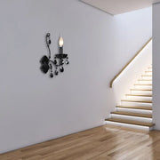 Modern black wrought iron cone wall mount sconce with dangling crystal droplets for living room lighting