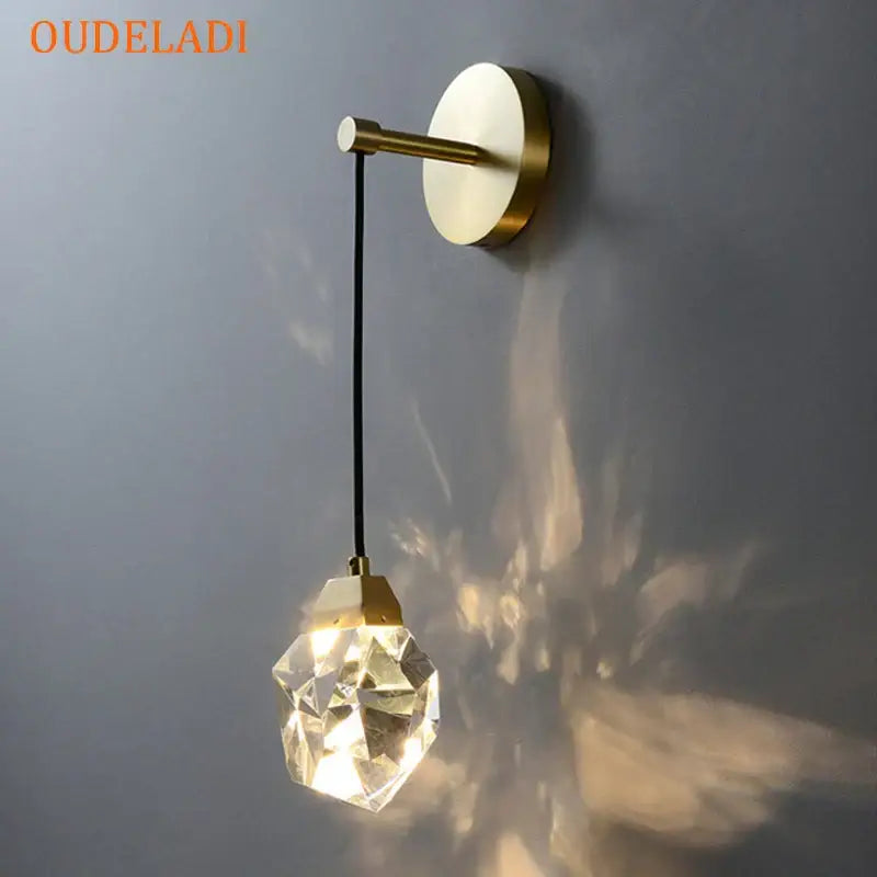 Modern crystal copper led wall lamp with brass base and faceted crystal globe for bedroom and stairs decorbites crystal copper