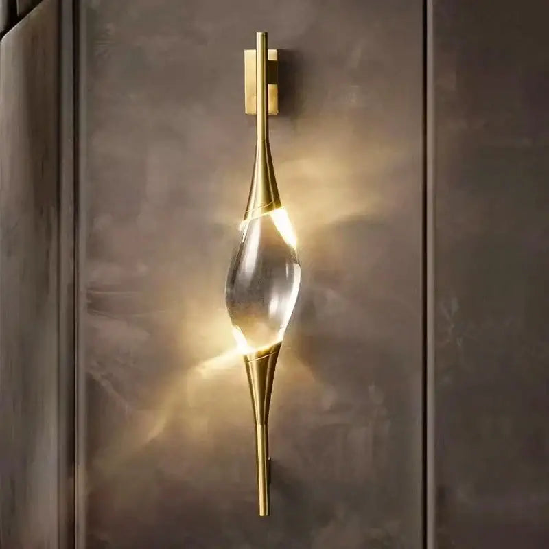 Modern crystal copper wall sconce with gold tone and clear teardrop crystal centerpiece for dining room decorbites crystal copper