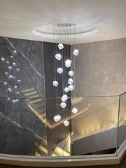A modern decorbites cube chandelier pendant featuring clear faceted crystal pendant lights for dining room decor