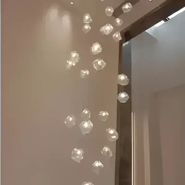 A modern crystal cube chandelier pendant with clear glass orbs cascading for dining room pendant lights decorbites cube chandelier