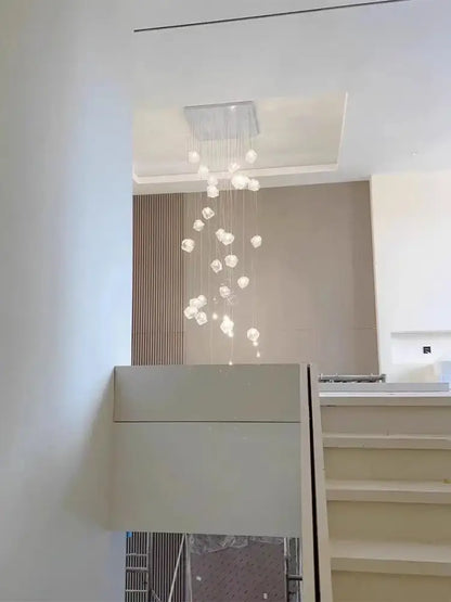 Modern crystal cube chandelier pendant lights with a sleek rectangular mount and soft white spherical glass orbs for dining decorbites cube chandelier