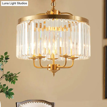 Lámpara colgante moderna de cristal cilíndrico - 4 luces, acabado en latón, brazo metálico curvo