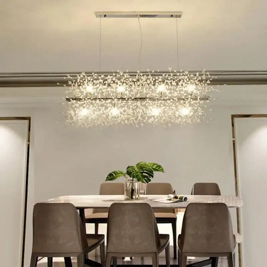 A modern crystal dandelion chandelier led hanging light with a sleek metallic frame and clear crystals for dining room decorbites