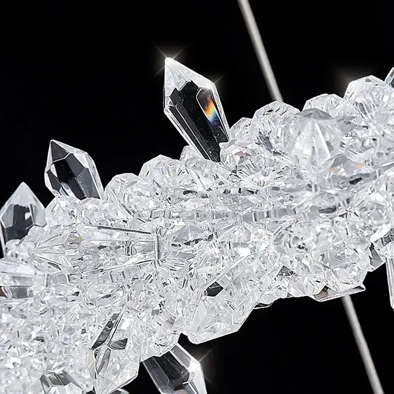 A cluster of clear faceted crystal formations with sharp points in modern decorbites crystal flower led chandelier