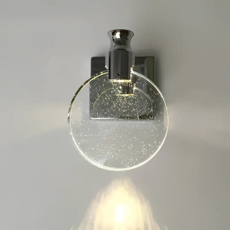 Modern crystal glass gold wall lamp with chrome finish and circular translucent glass shade featuring glittery specks