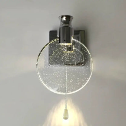 Modern chrome-finished wall lamp with decorbites crystal glass gold shade and elegant pull cord for bedroom sconce lighting