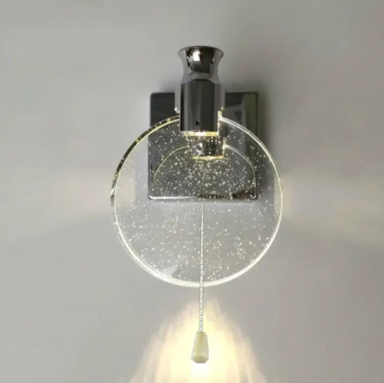 Modern chrome-finished wall lamp with decorbites crystal glass gold shade and elegant pull cord for bedroom sconce lighting