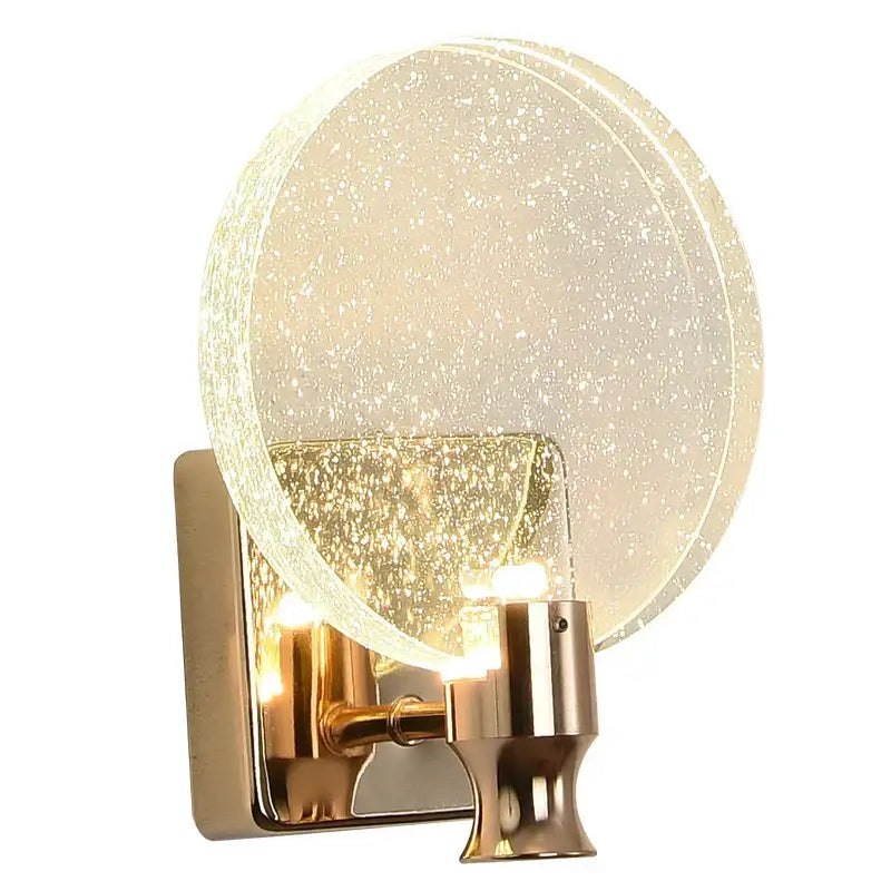 Modern crystal glass gold wall lamp featuring a gold-toned sconce with a circular frosted decorbites crystal glass shade
