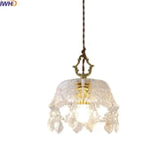 Clear crystal glass led pendant lamp with intricate cut glass design and brass accents for modern dining room decorbites