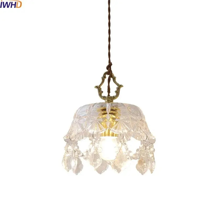 Clear crystal glass led pendant lamp with intricate cut glass design and brass accents for modern dining room decorbites