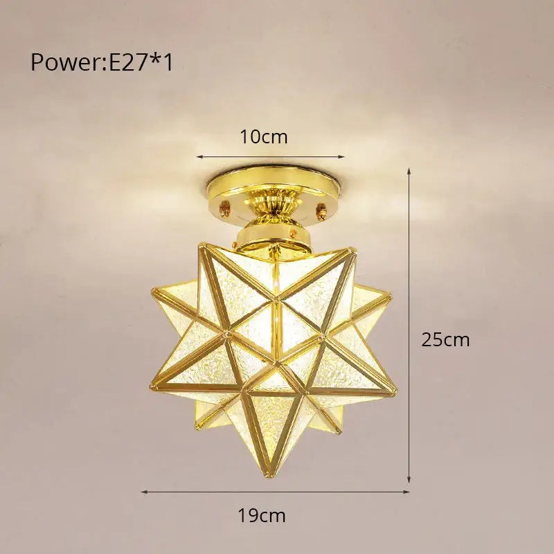 Golden star-shaped modern crystal glass nordic led ceiling light with frosted panels and brass finish for dining room decorbites