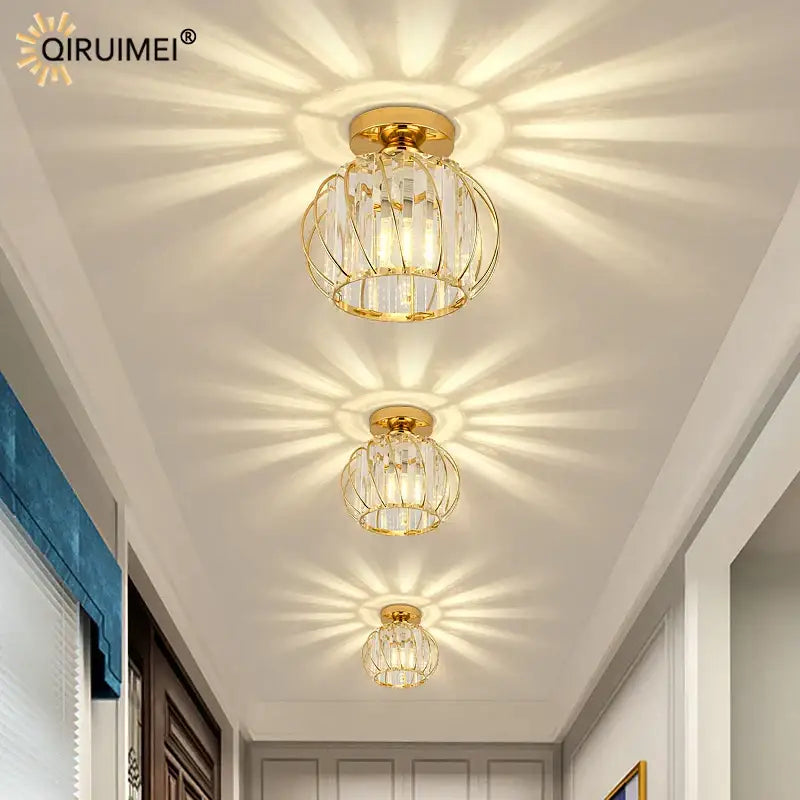 Modern crystal glass nordic led chandelier with gold finish spherical cage and clear glass accents for dining room decorbites crystal glass