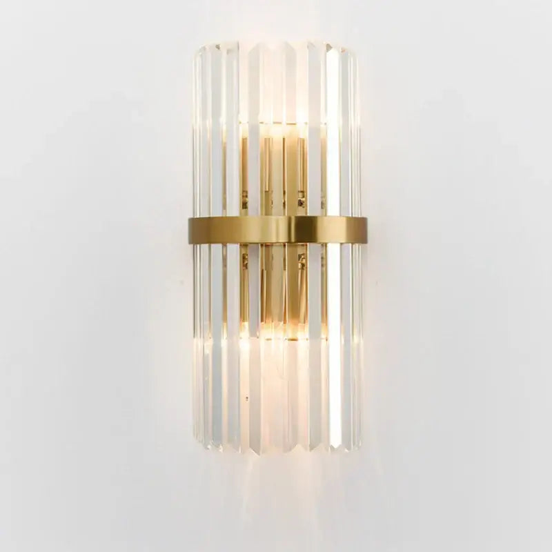Modern crystal gold led wall lamp with vertical crystal rods and gold-toned metal band for bedroom lighting decorbites crystal gold