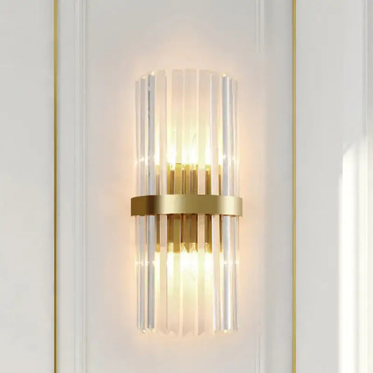 Modern crystal gold led wall sconce with vertical clear glass rods and central brass ring for elegant decorbites crystal gold lighting