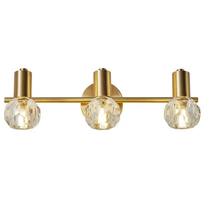 Gold-toned modern crystal gold wall lamp with three faceted globe shades for bedroom decorbites crystal gold wall lighting