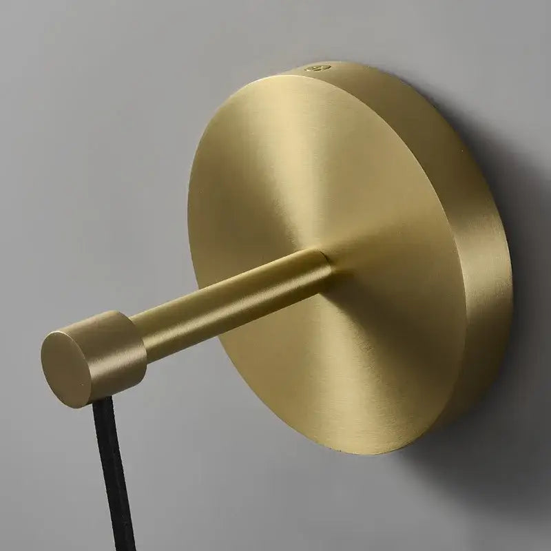 Brass-finished wall sconce with sleek minimalist design and matte finish for modern crystal golden bedroom decorbites crystal golden wall lighting