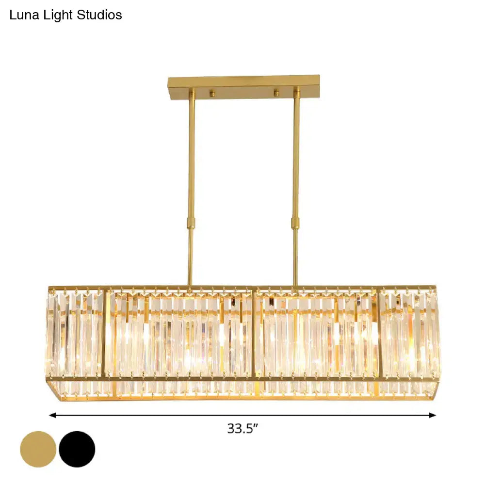 Gold-finished decorbites™ modern island light with vertical crystal rods and sleek black and gold rectangle shade