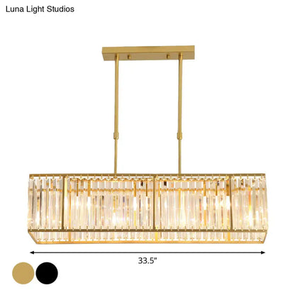 Gold-finished decorbites™ modern island light with vertical crystal rods and sleek black and gold rectangle shade
