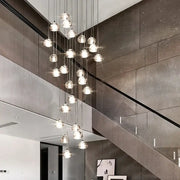 Modern crystal led ceiling chandelier with clear glass globe bulbs and cascading design for living room decorbites crystal led