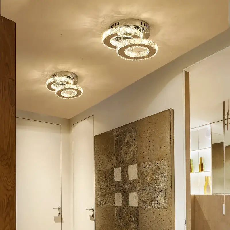 Modern chrome finished decorbites crystal led ceiling lamp with two interlocking crystal rings for living room decor