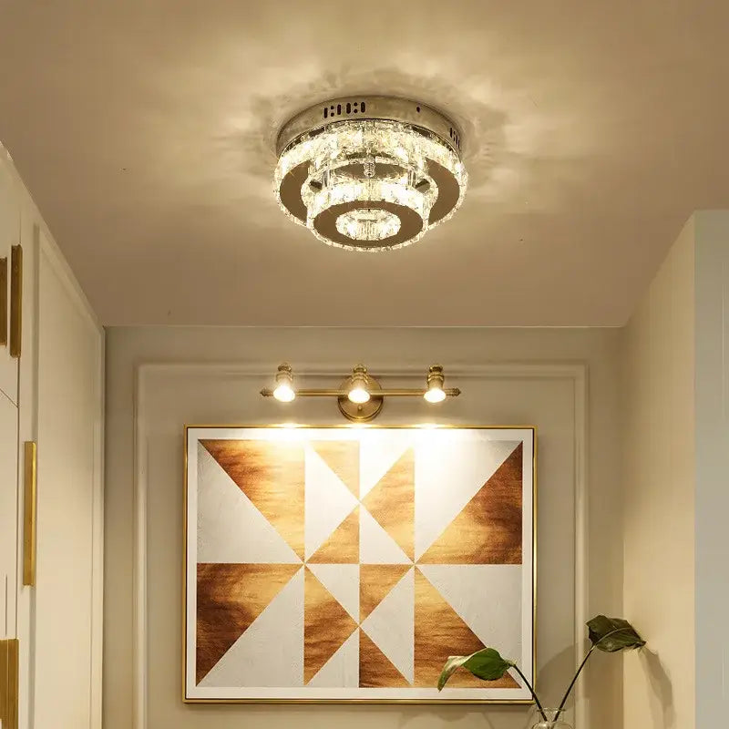 Modern crystal led ceiling lamp with a circular metallic frame and clear crystal tiers for living room decorbites crystal led lighting